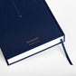 Back cover and ribbon detail of the World travel journal in navy blue