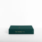 Spine view of the World travel journal, linen cover in forest green