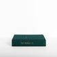 Horizontal view of the World travel journal, linen cover in forest green